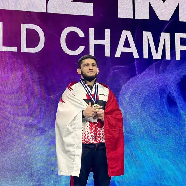Ramazan Gitinov on a championship podium