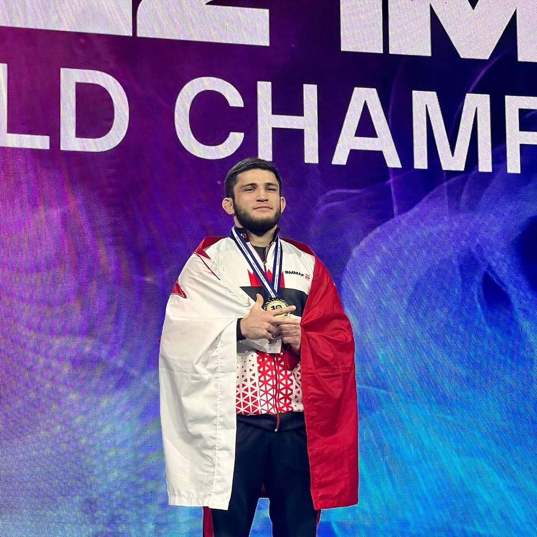 Ramazan Gitinov on a championship podium